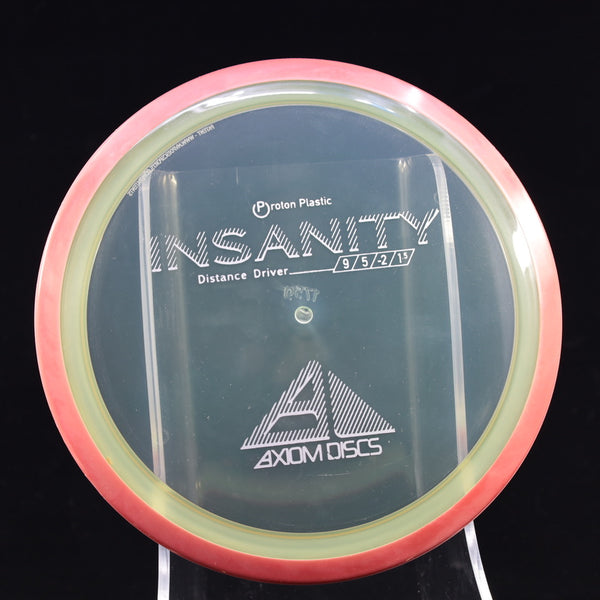 Axiom - Insanity - Proton - Distance Driver 170-175 8 CLEAR YELLOW RED 175 Axiom Axiom discs Disc Golf disc golf discs disc golf discs for sale discs Driver insanity MVP MVP Disc Sports neutron PROTON Stable Understable