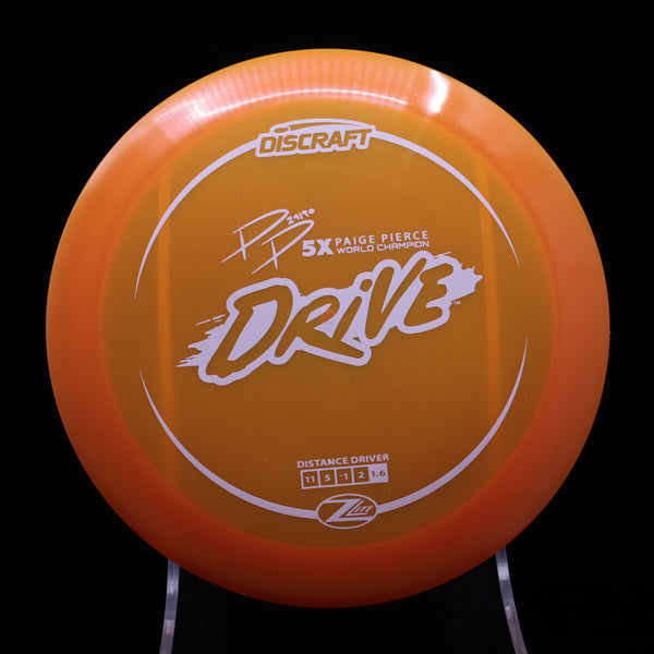 Discraft - Drive - Z Lite - Paige Pierce Signature Distance Driver 5 ORANGE WHITE 158 Discraft Paige Pierce Drive Discraft Paige Pierce prototype driver