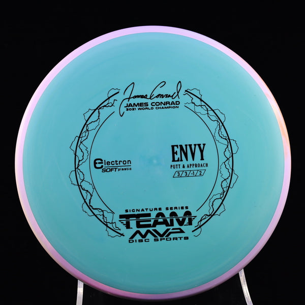 Axiom - Envy - Electron SOFT - James Conrad Signature Edition 170-175 5 CADET BLUE VIOLET 173 Appoach Approach Axiom Axiom discs conrad disc golf discs disc golf discs for sale discs envie envy james jamesconrad MVP MVP Disc Sports put putt Putt and Approach Putter Putter Pocket Putting soft z