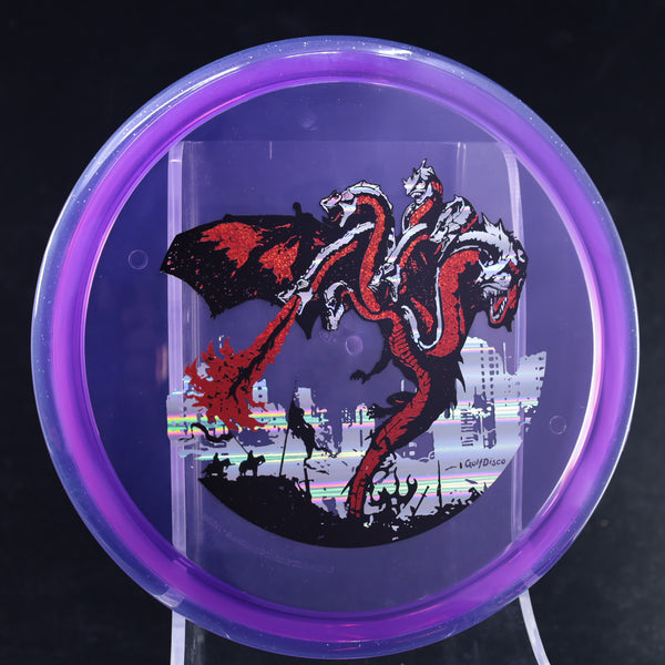 Axiom - Pyro - Prism Proton - GolfDisco Original "The Dragon" 23 PURPLE 177 7 headed dragon bad dragon dragon evil dragon evil vs good GOLFDISCO EXCLUSIVE CUSTOM STAMP golfdisco exclusive stamp golfdisco exclusive stamp design golfdisco original GOLFDISCO ORIGINALS