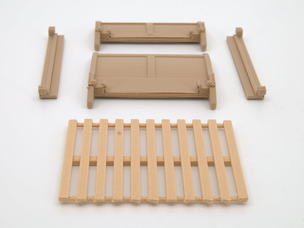 1:24 dollhouse sleigh bed kit parts laid out: headboard, footboard, 2 side rails, slat panel, real photo