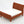 1:24 dollhouse sleigh bed with mattress in Terra Cotta, digital color preview of our real photo (slat panel stays Natural Oak)